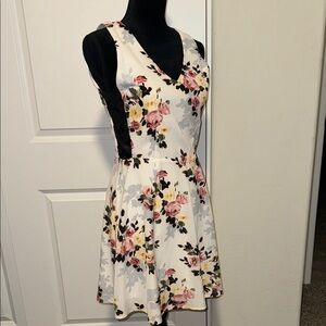 Pink and Yellow Floral Mini Sundress with V-neck and Sleeveless Design